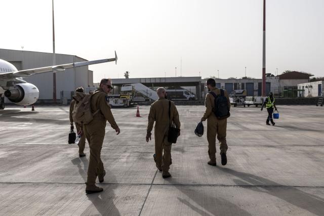 Members of the French Navy leave after a joint patrol against illicit maritime activities aboard a Falcon 50 aircraft alongside the Cape Verdean Coast Guards in Cape Verde, on April 2, 2026. A Falcon 50 aircraft has been deployed to Cape Verde as part of France’s mission to reinforce maritime security in the Gulf of Guinea through the CORYMBE Mission and to combat illicit maritime activities such as illegal, unreported and unregulated (IUU) fishing, drug trafficking or piracy. (Photo by PATRICK MEINHARDT / AFP)