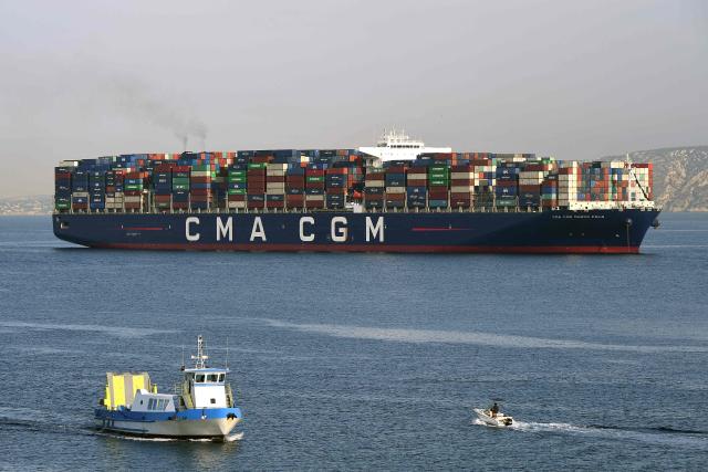(FILES) A container ship operated by the French CMA CGM shipping company runs into the port of Marseille on June 29, 2018. A CMA CGM container ship passed through the Strait of Hormuz declaring a "French owner," according to maritime tracking data, on April 3, 2026. (Photo by BORIS HORVAT / AFP)