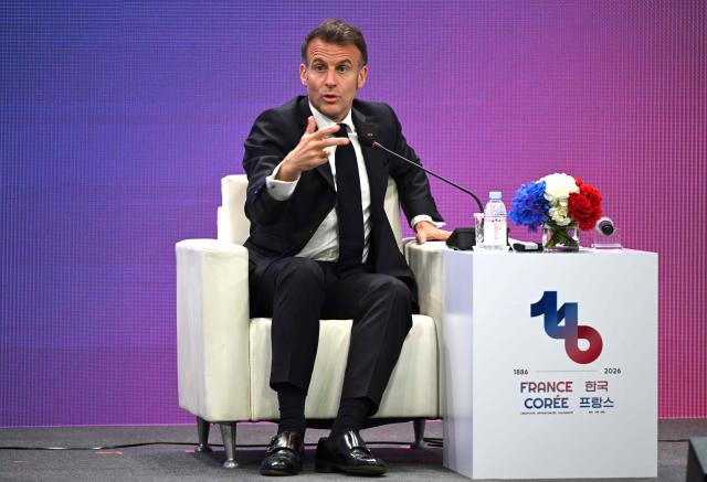 French President Emmanuel Macron speaks during a French-Korean business forum in Seoul on April 3, 2026. (Photo by Jung Yeon-je / AFP)