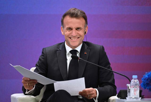 French President Emmanuel Macron speaks during a French-Korean business forum in Seoul on April 3, 2026. (Photo by Jung Yeon-je / AFP)