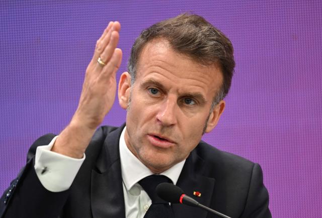 French President Emmanuel Macron speaks during a French-Korean business forum in Seoul on April 3, 2026. (Photo by Jung Yeon-je / AFP)