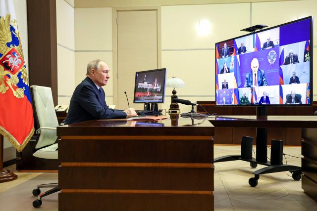 In this pool photograph distributed by the Russian state agency Sputnik, Russia's President Vladimir Putin chairs a Security Council meeting via videolink at the Novo-Ogaryovo state residence outside Moscow on April 3, 2026. (Photo by Alexander KAZAKOV / POOL / AFP)