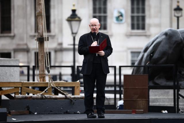 The Archbishop of Westminster Richard Moth speaks to the crowd ahead of a performance of Wintershall's 'The Passion of Jesus' on Good Friday in Trafalgar Square in London, on April 3, 2026. (Photo by Henry NICHOLLS / AFP)
