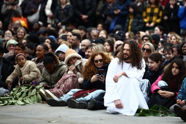 Reenactors put on a performance of Wintershall's 'The Passion of Jesus' on Good Friday in Trafalgar Square in London, on April 3, 2026. (Photo by Henry NICHOLLS / AFP)