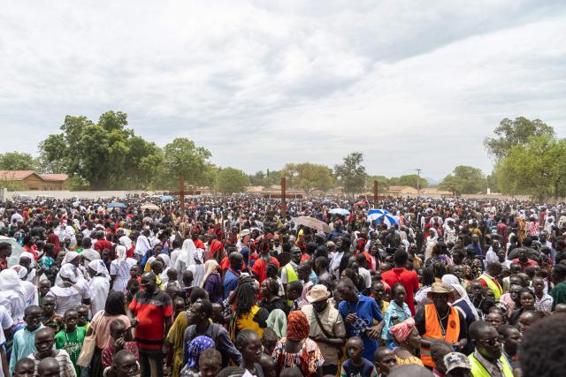 Thousands of Catholic worshippers gather at St. Theresa Cathedral Kator after completing a Good Friday procession from St. Kizito Parish in Juba on April 3, 2026. The joint church event commemorated the crucifixion of Jesus Christ and included prayers for peace in South Sudan. (Photo by Isaac Buay / AFP)