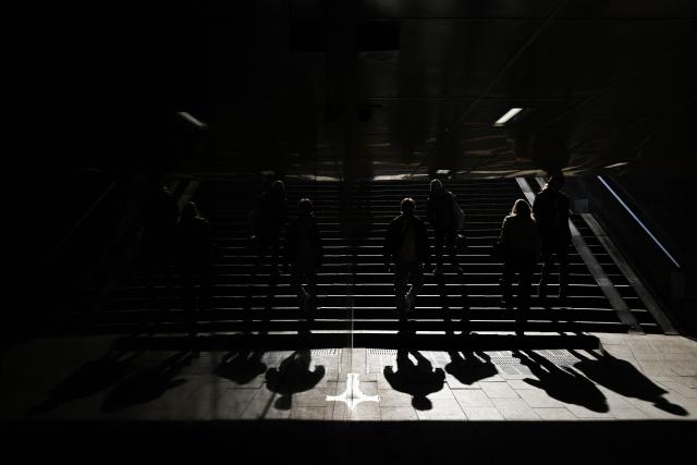 Pedestrians walk through the underground passage on Triumfalnaya Square in central Moscow, on April 3, 2026. (Photo by Igor IVANKO / AFP)