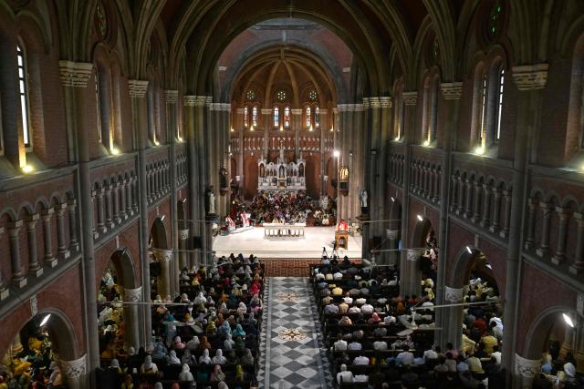 Christians attend a Good Friday Mass at Sacred Heart Cathedral in Lahore on April 3, 2026. (Photo by Arif ALI / AFP)