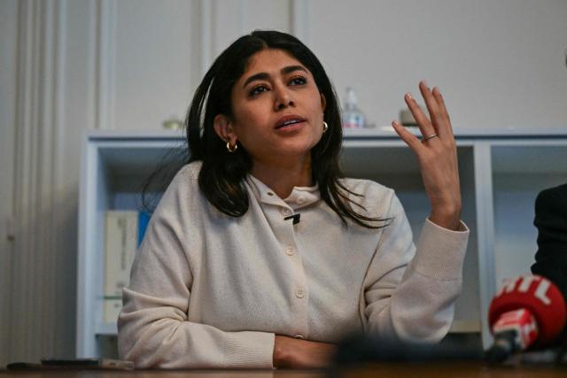 French-Palestinian member of the European Parliament Rima Hassan speaks during a press conference along with her lawyer following a hearing at the regional headquarters of the judiciary police in Paris, France, on April 3, 2026. La France Insoumise (LFI) MEP Rima Hassan was again questioned by judicial police on April 3, 2026, as part of an investigation separate from the suspicion of "glorification of terrorism" for which she was placed in police custody the day before. During a search of her belongings on April 2, 2026, "the presence of substances resembling CBD on the one hand and 3MMC (a synthetic drug) on the other, about which she was questioned" was discovered, the prosecutor's office said at the end of her police custody, adding that "these elements were separate and will be subject to a distinct procedure". (Photo by Blanca CRUZ / AFP)