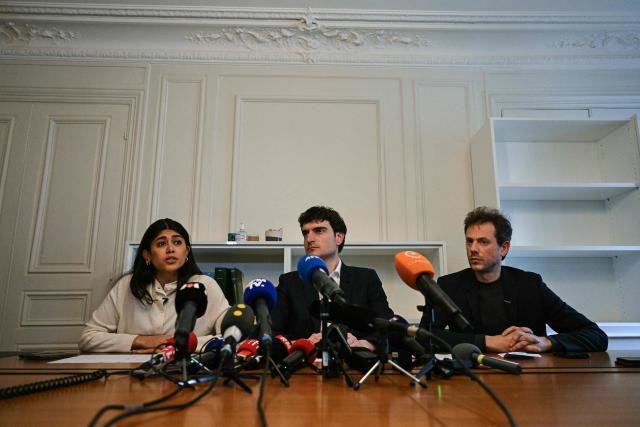 (From L) French-Palestinian member of the European Parliament Rima Hassan, her lawyer Vincent Brengarth and La France Insoumise - Nouveau Front Populaire's MP Paul Vannier (R) give a press conference following a hearing at the regional headquarters of the judiciary police in Paris, France, on April 3, 2026. La France Insoumise (LFI) MEP Rima Hassan was again questioned by judicial police on April 3, 2026, as part of an investigation separate from the suspicion of "glorification of terrorism" for which she was placed in police custody the day before. During a search of her belongings on April 2, 2026, "the presence of substances resembling CBD on the one hand and 3MMC (a synthetic drug) on the other, about which she was questioned" was discovered, the prosecutor's office said at the end of her police custody, adding that "these elements were separate and will be subject to a distinct procedure". (Photo by Blanca CRUZ / AFP)