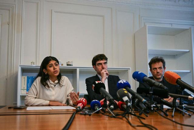 (From L) French-Palestinian member of the European Parliament Rima Hassan, her lawyer Vincent Brengarth and La France Insoumise - Nouveau Front Populaire's MP Paul Vannier (R) give a press conference following a hearing at the regional headquarters of the judiciary police in Paris, France, on April 3, 2026. La France Insoumise (LFI) MEP Rima Hassan was again questioned by judicial police on April 3, 2026, as part of an investigation separate from the suspicion of "glorification of terrorism" for which she was placed in police custody the day before. During a search of her belongings on April 2, 2026, "the presence of substances resembling CBD on the one hand and 3MMC (a synthetic drug) on the other, about which she was questioned" was discovered, the prosecutor's office said at the end of her police custody, adding that "these elements were separate and will be subject to a distinct procedure". (Photo by Blanca CRUZ / AFP)