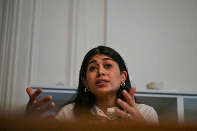 French-Palestinian member of the European Parliament Rima Hassan speaks during a press conference along with her lawyer following a hearing at the regional headquarters of the judiciary police in Paris, France, on April 3, 2026. La France Insoumise (LFI) MEP Rima Hassan was again questioned by judicial police on April 3, 2026, as part of an investigation separate from the suspicion of "glorification of terrorism" for which she was placed in police custody the day before. During a search of her belongings on April 2, 2026, "the presence of substances resembling CBD on the one hand and 3MMC (a synthetic drug) on the other, about which she was questioned" was discovered, the prosecutor's office said at the end of her police custody, adding that "these elements were separate and will be subject to a distinct procedure". (Photo by Blanca CRUZ / AFP)