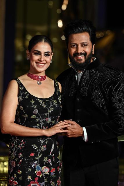 Bollywood actors Riteish Deshmukh (R) and Genelia D'Souza attend the celebrations for the third anniversary of The Nita Mukesh Ambani Cultural Centre in Mumbai on April 3, 2026. (Photo by Sujit JAISWAL / AFP)