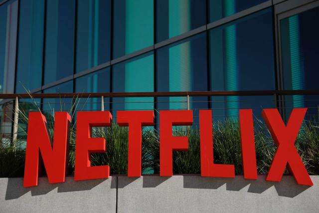(FILES) The Netflix logo is pictured at the company’s offices on Vine in Los Angeles, California on December 5, 2025. US streaming giant Netflix may have to reimburse hundreds of millions of euros to its Italian customers after a court ruling, according to a judgement published on April 3, 2026 by a consumer association. (Photo by Patrick T. Fallon / AFP)