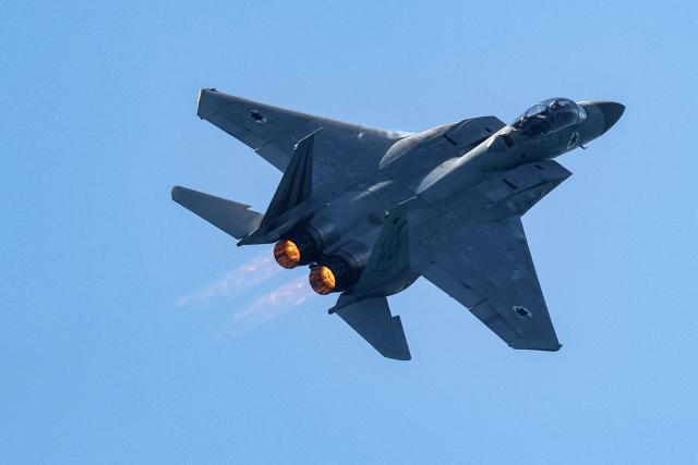 (FILES) An Israeli Air Force F-15E Strike Eagle fighter aircraft flies over during an air show in Tel Aviv on April 26, 2023, as Israel marks Independence Day (Yom HaAtzmaut), 75 years since the establishment of the Jewish state. A US warplane has gone down over Iran and US forces have rescued one of the crew, major US media outlets reported on April 3, after Iranian media aired footage of aircraft wreckage. (Photo by JACK GUEZ / AFP)