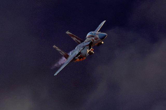 (FILES) Israel's F-15E Strike Eagle fighter plane performs maneuvers during the graduation ceremony of Israeli Air Force pilots at the Hatzerim base in the Negev desert, near the southern city of Beer Sheva, on June 29, 2023. A US warplane has gone down over Iran and US forces have rescued one of the crew, major US media outlets reported on April 3, after Iranian media aired footage of aircraft wreckage. (Photo by JACK GUEZ / AFP)