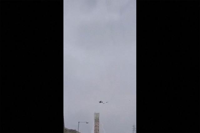 This video grab taken on April 3, 2026, from UGC images posted on social media on April 3, 2026 show a US aircraft, followed by two helicopters, flying over the town of Zaras in the southern Iran's Khuzestan province. (Photo by UGC / AFP) / Israel OUT / AFPTV TEAMS IN PARIS WERE ABLE TO VERIFY THE LOCATION OF THE VIDEOS THROUGH SATELLITE IMAGES. THE VIDEOS WERE FILMED IN ZARAS, IRAN. WE WERE UNABLE TO CONTACT THE AUTHORS OF THE VIDEOS. GPS COORDINATES: 31.591042143943394, 50.27496992971525 
Attention editors: AFP is covering the war in the Middle East through its extensive regional network, including its bureaus in Tehran, Beirut, Jerusalem, the Gulf monarchies, Iraq, Jordan, Syria and Egypt. However, since the start of the war, the agency's journalists have been working under increasingly restrictive conditions. Governments throughout the region have imposed limits on journalists' movements, including their ability to provide video live streams of what are regarded as sensitive locations. Several governments and armed groups have banned photo and video coverage of missile and drone strikes on what are seen as security-related sites, the interception of incoming missiles and drones, and the reporting of what could be construed as operational military details. / 