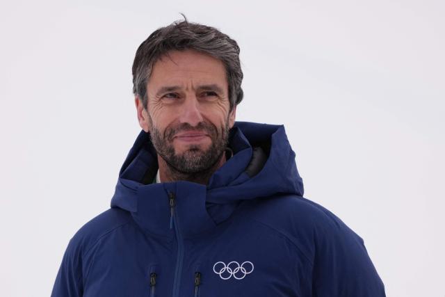 (FILES) International Olympic Committee (IOC) member and former French canoeist Tony Estanguet attends the podium ceremony of the men's giant slalom alpine skiing event during the Milano Cortina 2026 Winter Olympic Games at the Stelvio Ski Centre in Bormio (Valtellina) on February 14, 2026. The investigation into the remuneration, among other matters, of the president of the Paris 2024 Olympic Games Organizing Committee (Cojop), Tony Estanguet, has been closed with no further action, the National Financial Prosecutors Office (PNF) said on April 3, 2026, citing a "good-faith legal error". (Photo by Dimitar DILKOFF / AFP)