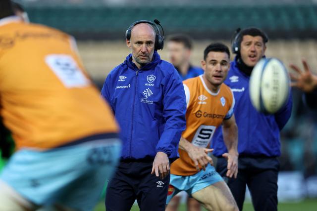Castres French coach Xavier Sadourny watches the players warm up before the European Rugby Champions Cup round of 16 rugby union match, between Northampton Saints and Castres Olympique at Franklin's Gardens in Northampton, central England, on April 3, 2026. (Photo by Darren Staples / AFP)