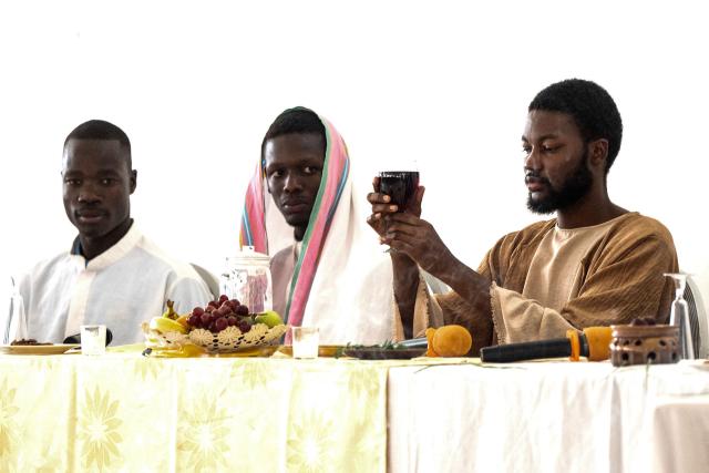 Christian faithful perform an interpretation of the life of Jesus Christ during the Stations of the Cross, at the Saint Christophe parish in Yoff in Dakar, on April 3, 2026. (Photo by SEYLLOU / AFP)