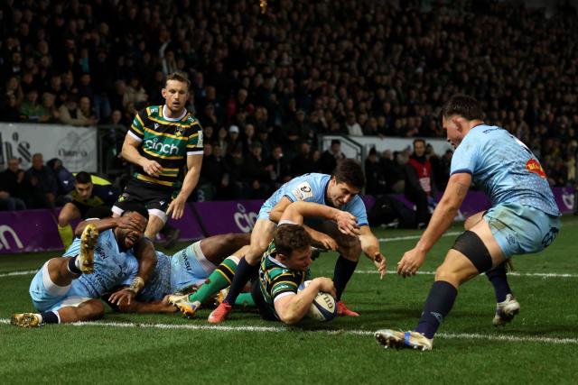 Northampton Saints' English centre Fraser Dingwall scores the team's seventh try during the European Rugby Champions Cup round of 16 rugby union match, between Northampton Saints and Castres Olympique at Franklin's Gardens in Northampton, central England, on April 3, 2026. (Photo by Darren Staples / AFP)