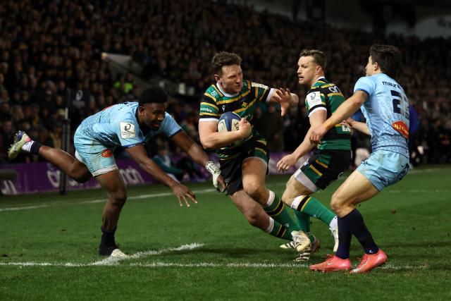 Northampton Saints' English centre Fraser Dingwall runs with the ball to score the team's seventh try during the European Rugby Champions Cup round of 16 rugby union match, between Northampton Saints and Castres Olympique at Franklin's Gardens in Northampton, central England, on April 3, 2026. (Photo by Darren Staples / AFP)