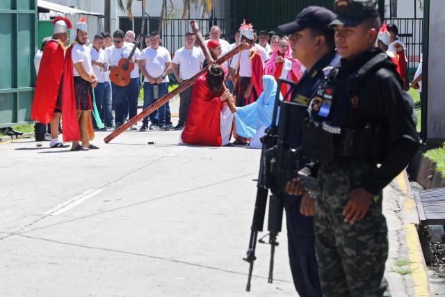 Inmates at the Tamara Penitentiary Center reenact the Via Crucis during Good Friday in Tegucigalpa, on April 3, 2026. (Photo by JOHNY MAGALLANES / AFP)