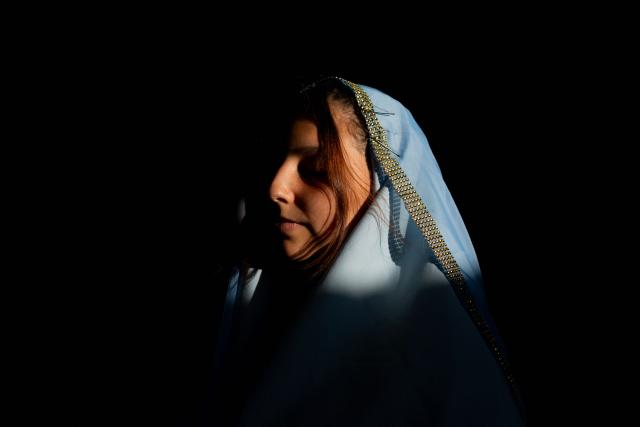 A youngster from the Sacred Heart of Jesus Parish enacts the Passion of Jesus Christ during Via Crusis (Way of the Cross) on Good Friday in Colina, Chile on April 3, 2026. (Photo by Javier TORRES / AFP)