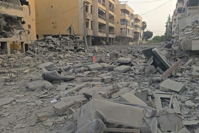 This photograph shows the destruction at the site of an Israeli airstrike in the Al Hosh area near the coastal Lebanese city of Tyre on April 4, 2026. The Israeli military said on April 3, it had struck more than 3,500 targets across Lebanon in the month since fighting with Iran-backed Hezbollah militants. Lebanon was drawn into the Middle East war on March 2 when Hezbollah launched attacks on Israel to avenge the killing of the Iranian leader. Israel has responded with broad strikes across Lebanon and a ground offensive. (Photo by Kawnat HAJU / AFP)