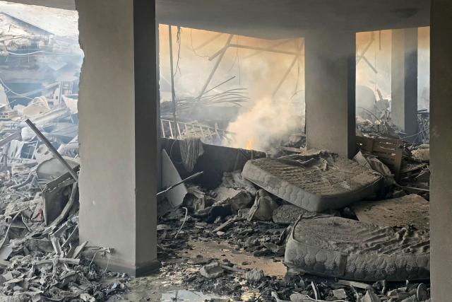 This photograph shows the destruction at the site of an Israeli airstrike in the Al Hosh area near the coastal Lebanese city of Tyre on April 4, 2026. The Israeli military said on April 3, it had struck more than 3,500 targets across Lebanon in the month since fighting with Iran-backed Hezbollah militants. Lebanon was drawn into the Middle East war on March 2 when Hezbollah launched attacks on Israel to avenge the killing of the Iranian leader. Israel has responded with broad strikes across Lebanon and a ground offensive. (Photo by Kawnat HAJU / AFP)