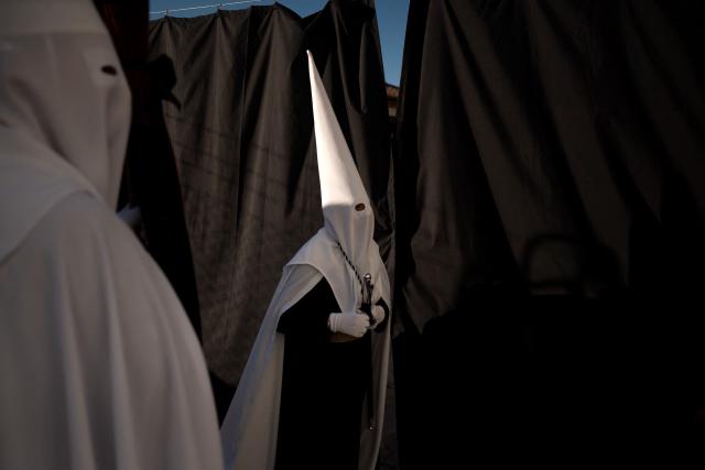 Penitents of the “Santo Entierro de Cristo” brotherhood take part in Good Friday procession in Ronda on April 3, 2026. Christian believers around the world mark the Holy Week of Easter in celebration of the crucifixion and resurrection of Jesus Christ. (Photo by JORGE GUERRERO / AFP)