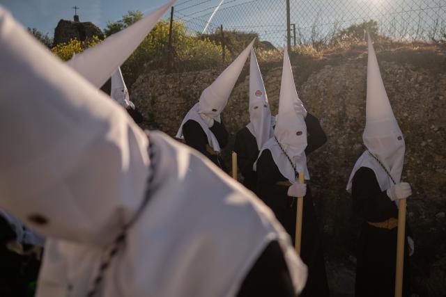 Penitents of the “Santo Entierro de Cristo” brotherhood take part in Good Friday procession in Ronda on April 3, 2026. Christian believers around the world mark the Holy Week of Easter in celebration of the crucifixion and resurrection of Jesus Christ. (Photo by JORGE GUERRERO / AFP)