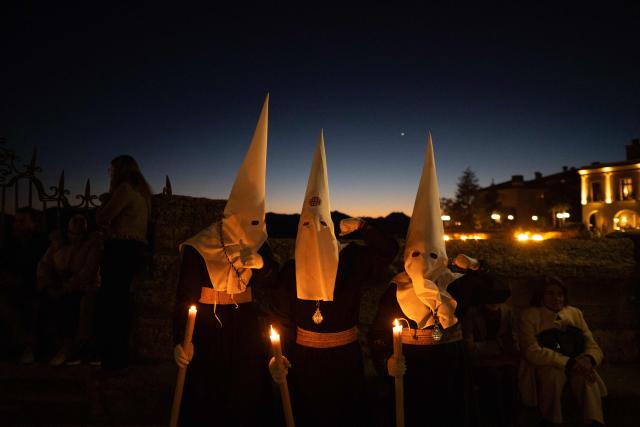 Penitents of the “Santo Entierro de Cristo” brotherhood take part in Good Friday procession in Ronda on April 3, 2026. Christian believers around the world mark the Holy Week of Easter in celebration of the crucifixion and resurrection of Jesus Christ. (Photo by JORGE GUERRERO / AFP)