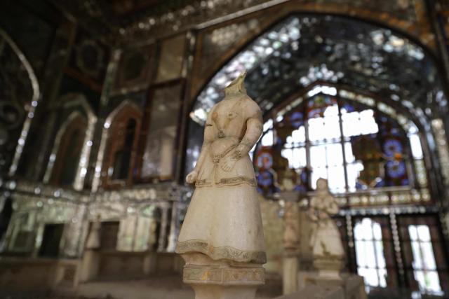 The damaged interiors of the historic Golestan Palace are pictured in Tehran on April 4, 2026. Since the start of the war, a senior Tehran cultural official said US and Israeli strikes have damaged at least 120 museums and cultural and historic sites nationwide, including the capital's UNESCO-listed Golestan Palace -- sometimes likened to Versailles. The palace complex is one of the oldest sites in the Iranian capital and once served as the residence of the Qajar dynasty. (Photo by ATTA KENARE / AFP) / 