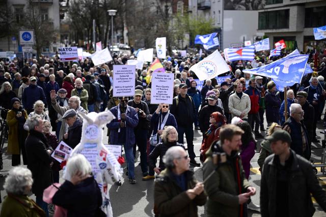 Protesters attend an Easter March Peace demonstration organised by the Berlin Peace Coordination (FRIKO) in Berlin, on April 4, 2026. (Photo by Tobias SCHWARZ / AFP)