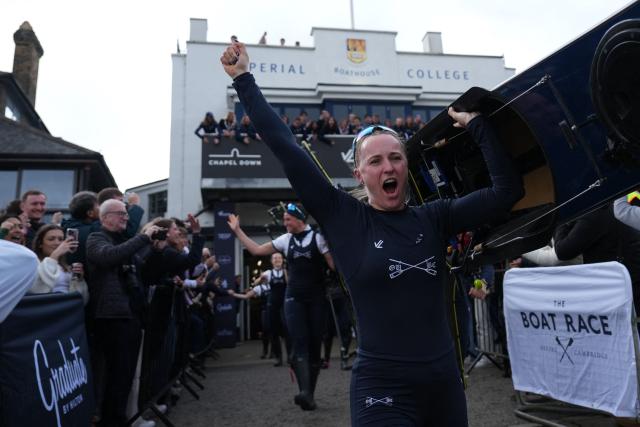 The Oxford boat is taken to the river ahead of the 80th Women's boat race between Oxford University and Cambridge University on the River Thames in London on April 4, 2026. (Photo by CARLOS JASSO / AFP)