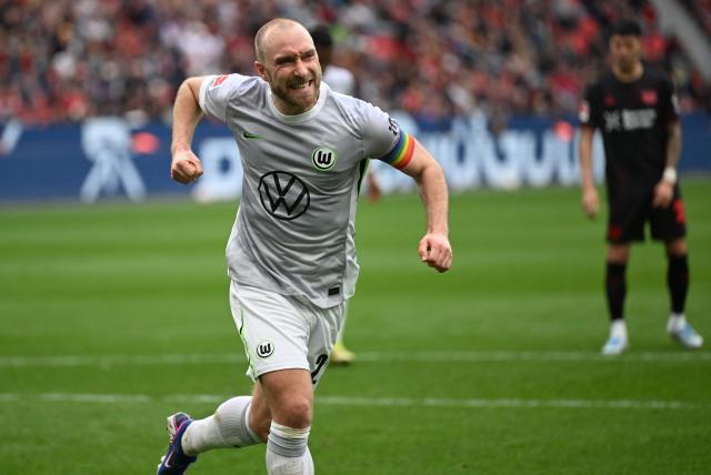 Wolfsburg's Danish midfielder #24 Christian Eriksen celebrates scoring a penalty during the German first division Bundesliga football match between Bayer leverkusen and VfL Wolfsburg in Leverkusen on April 4, 2026. (Photo by INA FASSBENDER / AFP) / DFL REGULATIONS PROHIBIT ANY USE OF PHOTOGRAPHS AS IMAGE SEQUENCES AND/OR QUASI-VIDEO