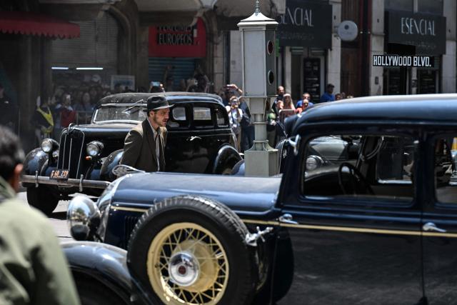 Chilean actor Pedro Pascal performs for a scene of his new movie, "De Noche", which is being shot on a street of the historic center of Mexico City on April 3, 2026. (Photo by Yuri CORTEZ / AFP)