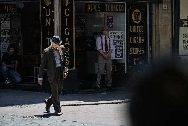 Chilean actor Pedro Pascal (L) performs for a scene of his new movie, "De Noche", which is being shot on a street of the historic center of Mexico City on April 3, 2026. (Photo by Yuri CORTEZ / AFP)
