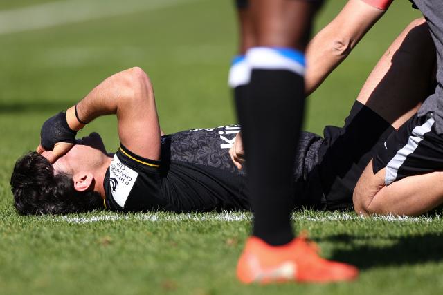 Toulon's French full-back Marius Domon lays on the pitch injured during the European Rugby Champions Cup round of 16 rugby union match, between the Rugby Club Toulonnais (RCT) and the Stormers (Western Province) at the Stade Mayol in Toulon on April 4, 2026. (Photo by Clement MAHOUDEAU / AFP)