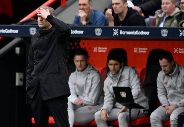 Bayer Leverkusen's Danish head coach Kasper Hjulmand reacts during the German first division Bundesliga football match between Bayer leverkusen and VfL Wolfsburg in Leverkusen on April 4, 2026. (Photo by INA FASSBENDER / AFP) / DFL REGULATIONS PROHIBIT ANY USE OF PHOTOGRAPHS AS IMAGE SEQUENCES AND/OR QUASI-VIDEO