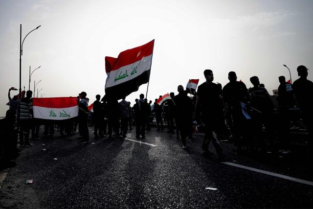 People gather for a demonstration in solidarity with Iran and denouncing the US-Israeli war against it, in Iraq's southern city of Basra on April 4, 2026. Iraq, long a proxy battleground between the United States and Iran, was quickly dragged into the Middle East war triggered by US and Israeli strikes on Iran on February 28. (Photo by Hussein FALEH / AFP)