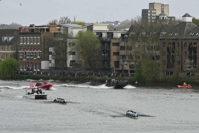 The Cambridge crew lead Oxford at the finish of the 171th men's boat race between Oxford University and Cambridge University on the River Thames in London on April 4, 2026. (Photo by JUSTIN TALLIS / AFP)