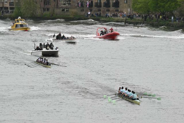 The Cambridge crew lead Oxford at the finish of the 171th men's boat race between Oxford University and Cambridge University on the River Thames in London on April 4, 2026. (Photo by JUSTIN TALLIS / AFP)