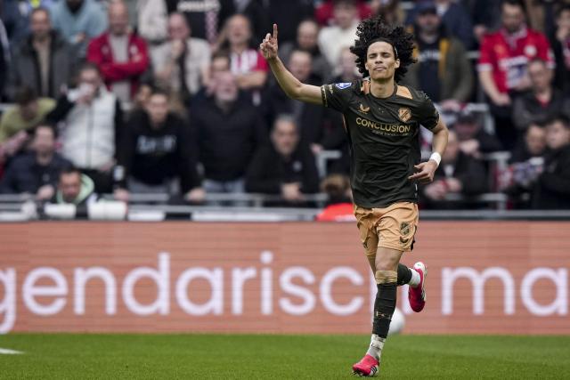 Utrecht's Dutch midfielder #21 Gjivai Zechiel celebrates after scoring his team's second goal during the Dutch Eredivisie football match between PSV Eindhoven and FC Utrecht at Philips Stadion in Eindhoven on April 4, 2026. (Photo by Tobias Kleuver / ANP / AFP) / Netherlands OUT