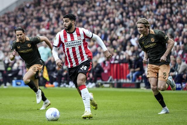 Utrecht's Belgian defender #02 Siebe Horemans (L) fights for the ball with PSV Eindhoven's Moroccan midfielder #34 Ismael Saibari (C) and Utrecht's Danish defender #23 Niklas Vesterlund during the Dutch Eredivisie football match between PSV Eindhoven and FC Utrecht at Philips Stadion in Eindhoven on April 4, 2026. (Photo by Tobias Kleuver / ANP / AFP) / Netherlands OUT