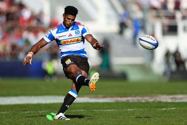 Stormers' South African fly-half Sacha Feinberg-Mngomezulu kicks the ball to convert a try during the European Rugby Champions Cup round of 16 rugby union match, between the Rugby Club Toulonnais (RCT) and the Stormers (Western Province) at the Stade Mayol in Toulon on April 4, 2026. (Photo by Clement MAHOUDEAU / AFP)