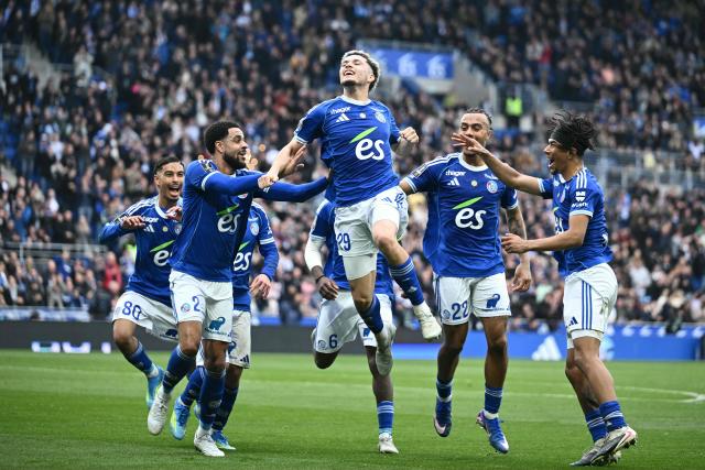 Strasbourg's French midfielder #29 Samir El Mourabet (C) celebrates scoring his team's third goal during the French L1 football match between RC Strasbourg Alsace and OGC Nice at the Stade de la Meinau in Strasbourg, eastern France, on April 4, 2026. (Photo by SEBASTIEN BOZON / AFP)