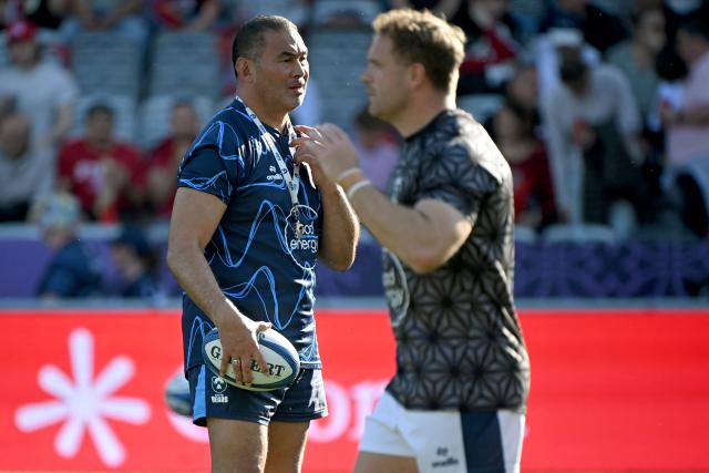 Bristol Rugby's Samoa coach Pat Lam (L) looks on during warm up prior to the European Rugby Champions Cup round of 16 rugby union match between Stade Toulousain and Bristol at the Ernest-Wallon stadium in Toulouse, south-western France on April 4, 2026. (Photo by Matthieu RONDEL / AFP)