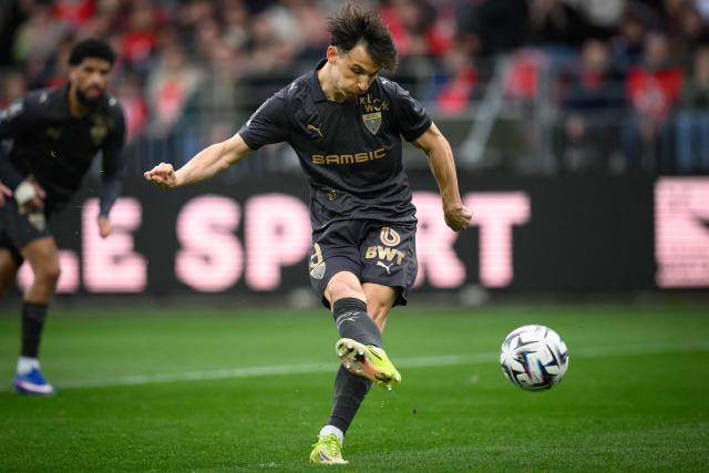 Rennes' French forward #09 Esteban Lepaul scores a penalty shot after scoring a penalty shot during the French L1 football match between Stade Brestois 29 (Brest) and Stade Rennais FC  at the Stade Francis-Le-Ble in Brest, western France, on April 4, 2026. (Photo by Loic VENANCE / AFP)
