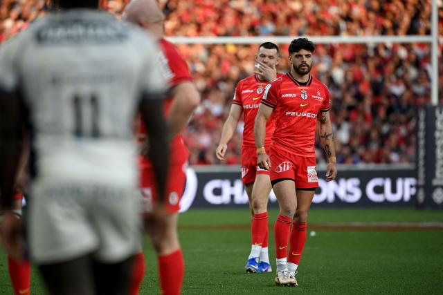 Toulouse's French fly-half Romain Ntamack (R) looks on during the European Rugby Champions Cup round of 16 rugby union match between Stade Toulousain and Bristol at the Ernest-Wallon stadium in Toulouse, south-western France on April 4, 2026. (Photo by Matthieu RONDEL / AFP)